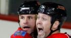 Flames rally from three goals down to beat Sharks