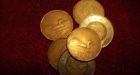 Oil-stained loonies circulating
