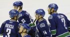 Canucks rally to preserve win streak
