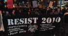 Protesters mark the one-year 2010 countdown