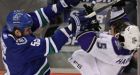 Canucks withstand L.A. rally