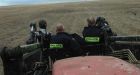 Tractor bucket used as community helps nab suspects